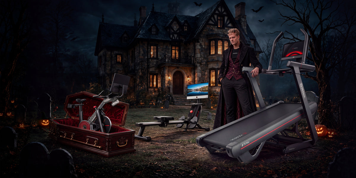 A Halloween home-fitness scene with Yesoul equipment.
